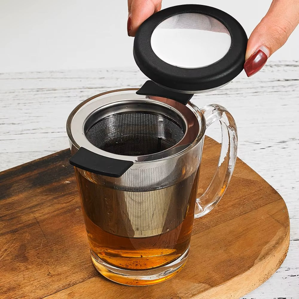 Using Cool Touch Tea Strainer With Silicone Lid Grip